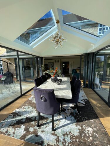 Kitchen conservatory with dining table